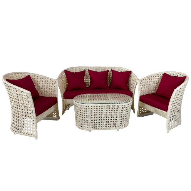 Wicker outdoor furniture set with red cushions on a white background
