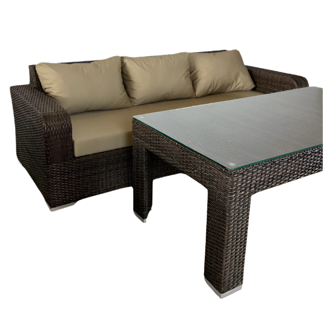 Wicker outdoor furniture set with a sofa and coffee table on a white background