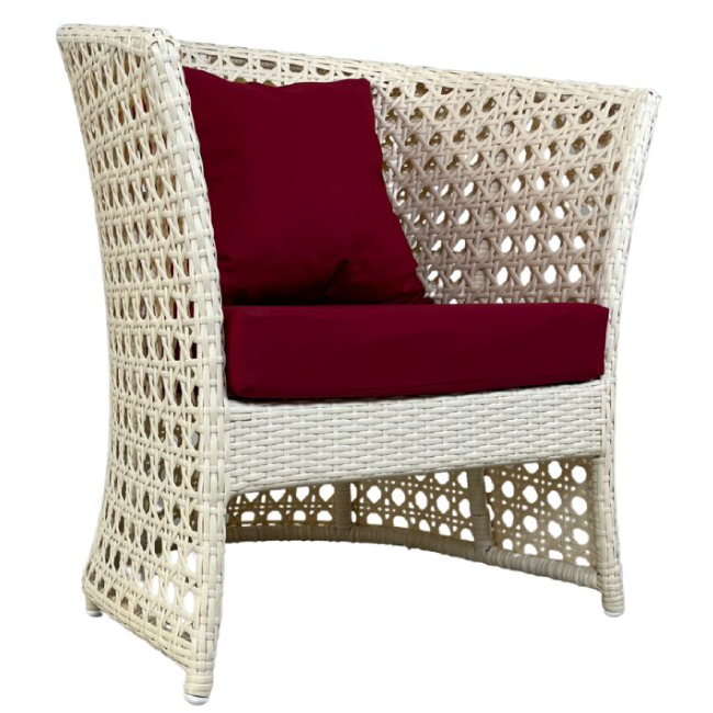 Wicker chair with red cushions on a white background