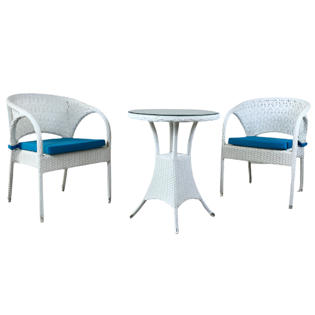 White wicker chairs with blue cushions and a matching table on a white background