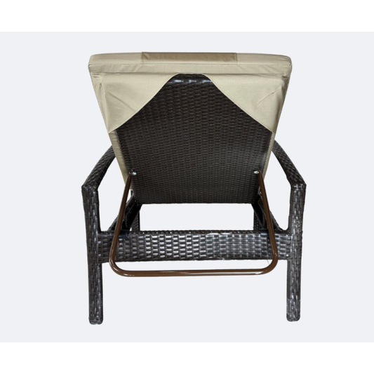 Brown wicker outdoor lounge chair with beige cushions on a white background