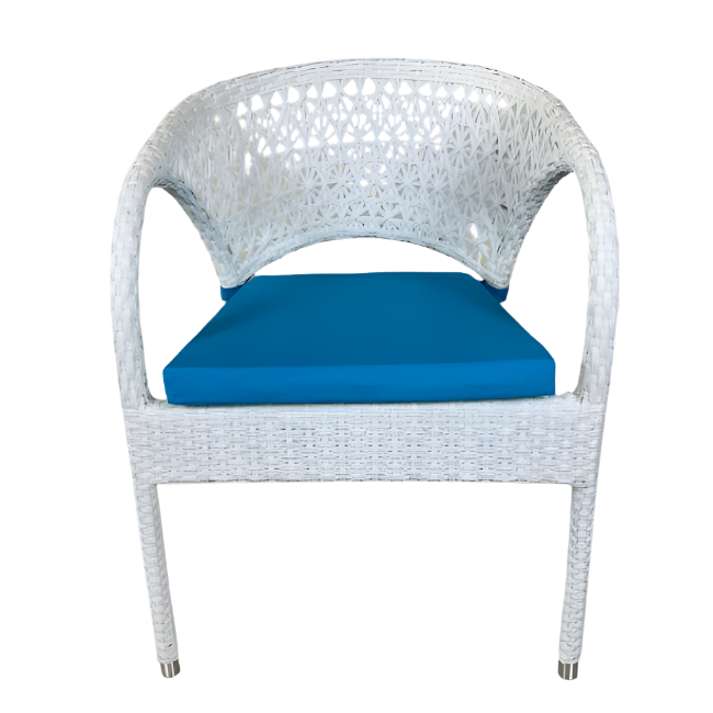 White wicker chair with a blue cushion on a beige background