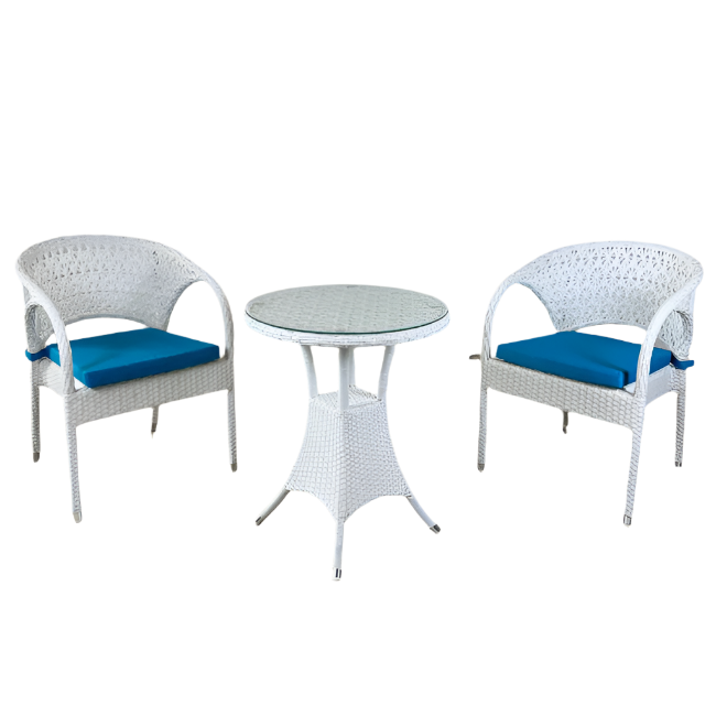 White wicker chairs with blue cushions and a matching table on a beige background
