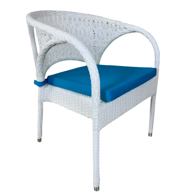 White wicker chair with blue cushion on a beige background