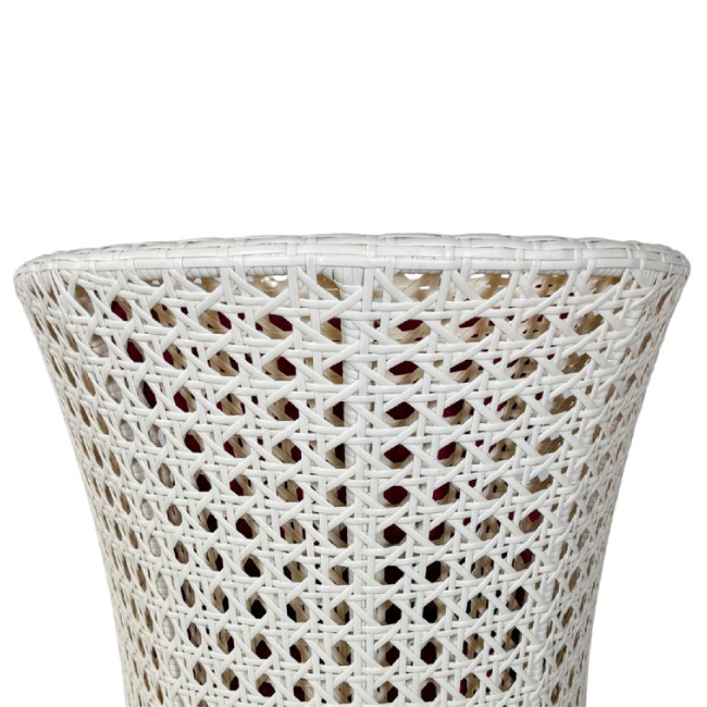 Wicker outdoor furniture set with red cushions on a white background