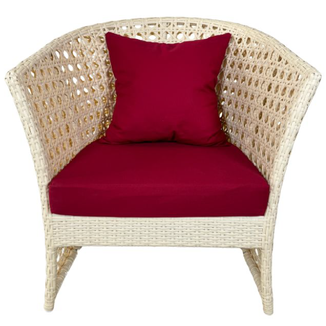 Wicker chair with red cushions on a white background