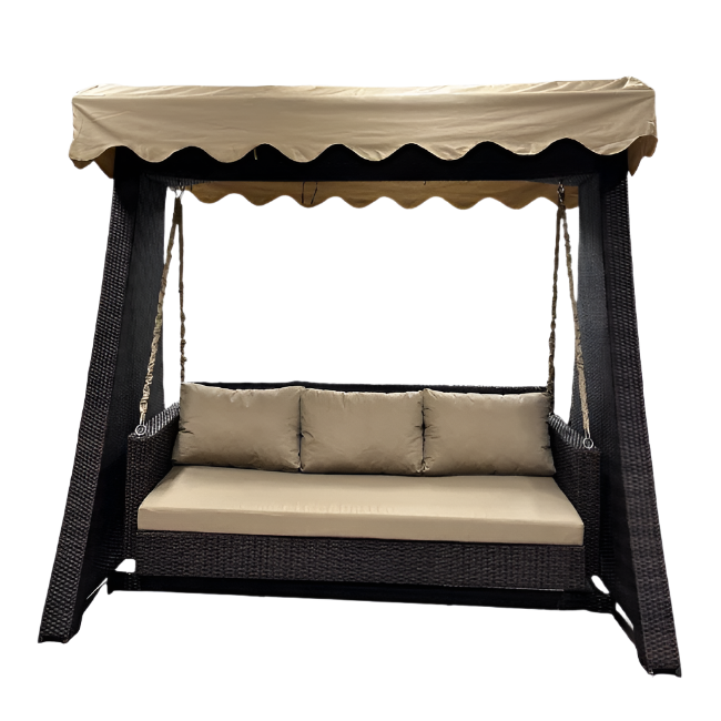 Wicker swing bed with canopy and beige cushions on a white background