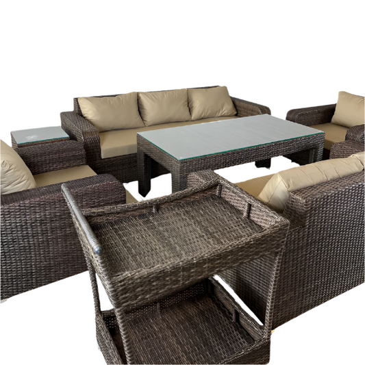 Wicker outdoor furniture set with beige cushions on a white background