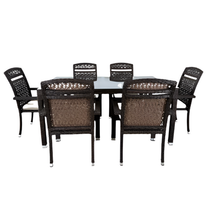 Dining table set with six chairs on a white background